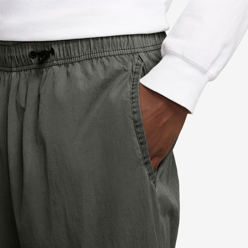 NIKE TECH WOVEN ZIP-OFF PANTS "SEQUOIA/BLACK"