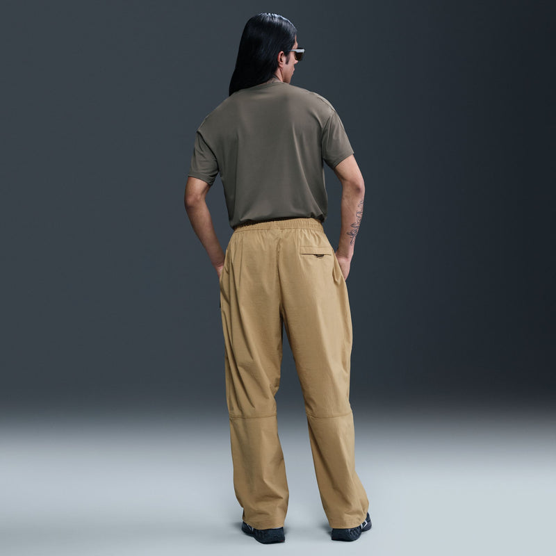 NIKE TECH WOVEN OVERSIZED PANTS "PARACHUTE BEIGE/PARACHUTE BEIGE/BLACK"