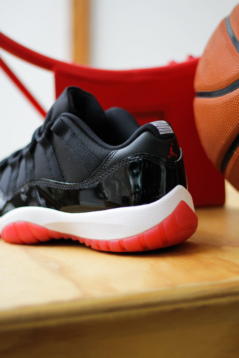 AIR JORDAN 11 RETRO LOW "BLACK/VARSITY RED-WHITE"