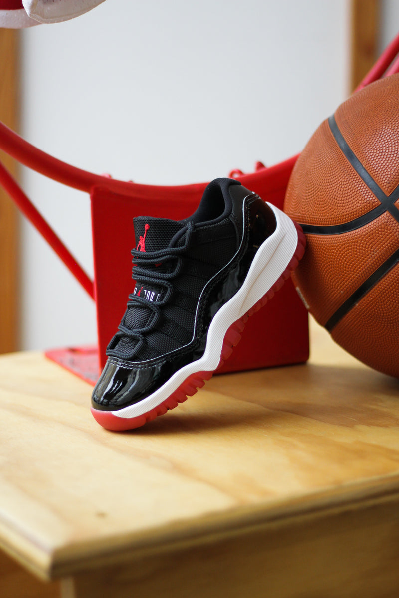 JORDAN 11 RETRO LOW (PS) "BLACK/VARSITY RED-WHITE"