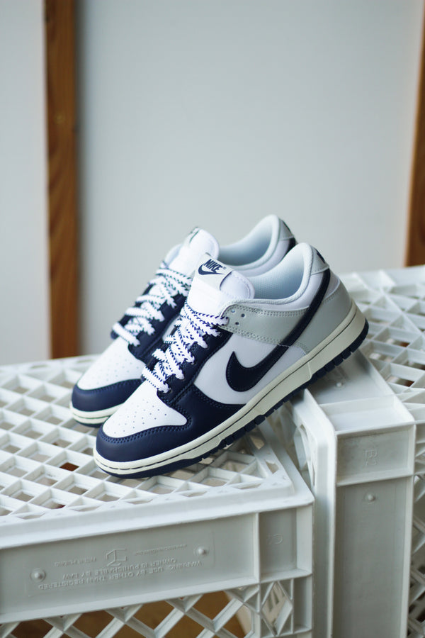 NIKE DUNK LOW RETRO "WHITE/MIDNIGHT NAVY-PHOTON DUST"