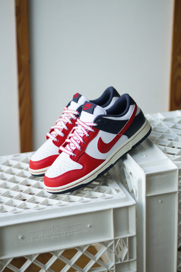 NIKE DUNK LOW RETRO "WHITE/UNIVERSITY RED-THUNDER BLUE"