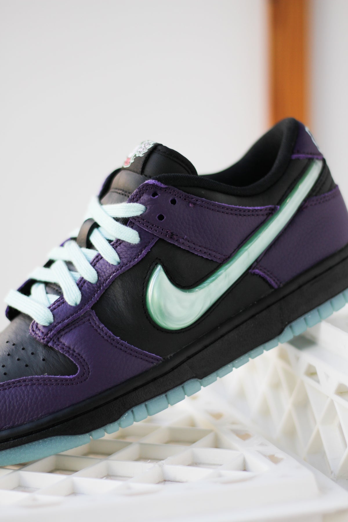 Nike Black and Purple Sneakers with Teal Highlights Where to Buy: Nike Dunk Low Limited  main image 4