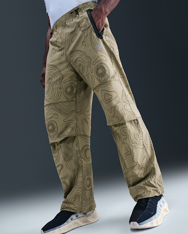 NIKE TECH OPEN HEM WOVEN PANTS "CARGO KHAKI"