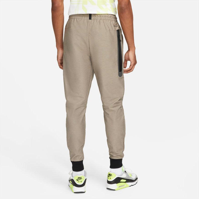 NSW DRI-FIT TECH PACK UNLINE TRACK PANT "MOON FOSSIL"